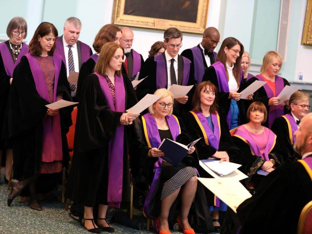 Reading vows at commencement ceremony